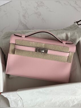 SOLD Hermes Kelly Pochette in Rose Sakura Swift Leather Palladium Hardware 2025